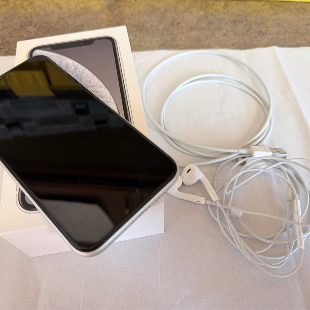 Apple iPhone with White Earphones